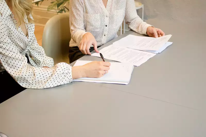 This is an image of a professional negotiating a lease. 